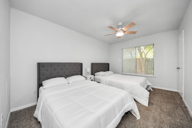 6430 Grandvale Dr, Houston, TX 77072 - carpeted bedroom with baseboards and ceiling fan