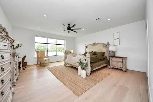 5327 S Braeswood Blvd, Houston, TX 77096 - bedroom with recessed lighting, light wood-type flooring, a ceiling fan, and baseboards