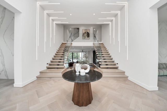 5327 S Braeswood Blvd, Houston, TX 77096 - entrance foyer with stairs and baseboards