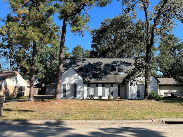 602 Rosewood Dr, Shenandoah, TX 77381 - cape cod home with a front lawn, brick siding, and a shingled roof
