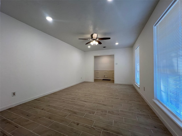 602 Rosewood Dr, Shenandoah, TX 77381 - empty room with dark wood-style floors, ceiling fan, baseboards, and recessed lighting