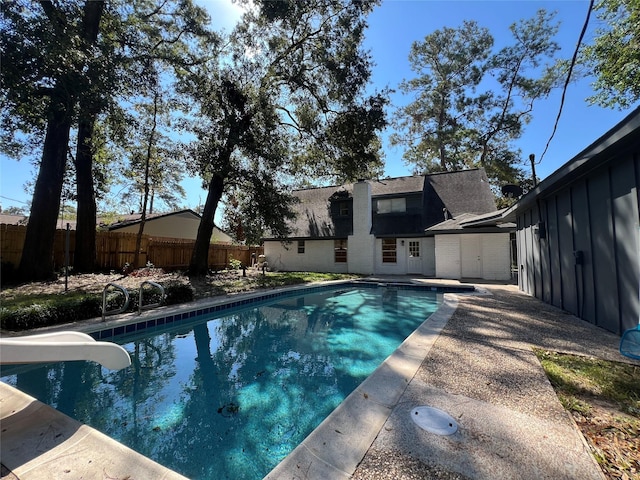 602 Rosewood Dr, Shenandoah, TX 77381 - view of swimming pool with fence and a water slide