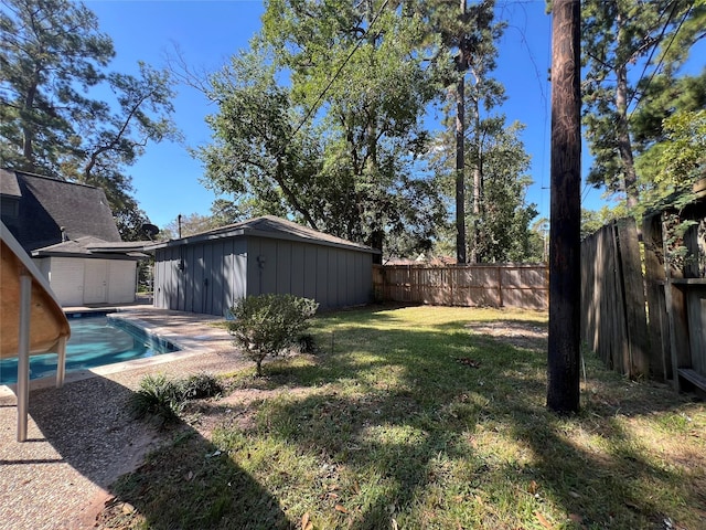 602 Rosewood Dr, Shenandoah, TX 77381 - view of yard featuring an outbuilding and a storage unit