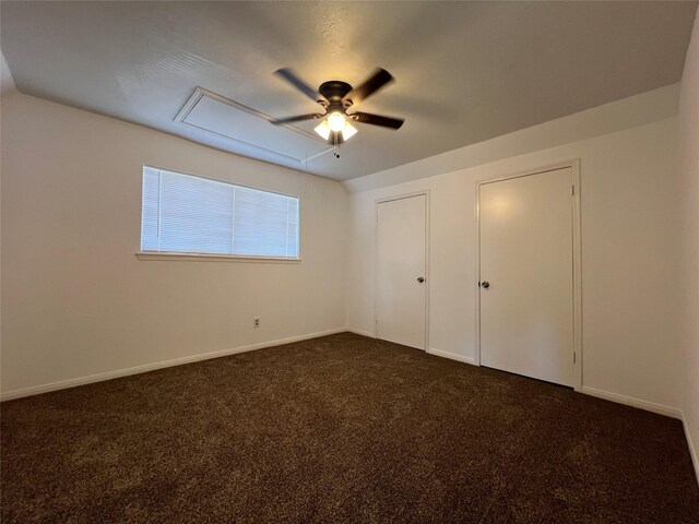 602 Rosewood Dr, Shenandoah, TX 77381 - unfurnished bedroom with attic access, dark carpet, baseboards, and ceiling fan