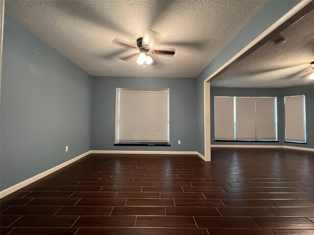 15903 Brookvilla Dr, Houston, TX 77059 - spare room featuring a textured ceiling, ceiling fan, baseboards, and wood finish floors