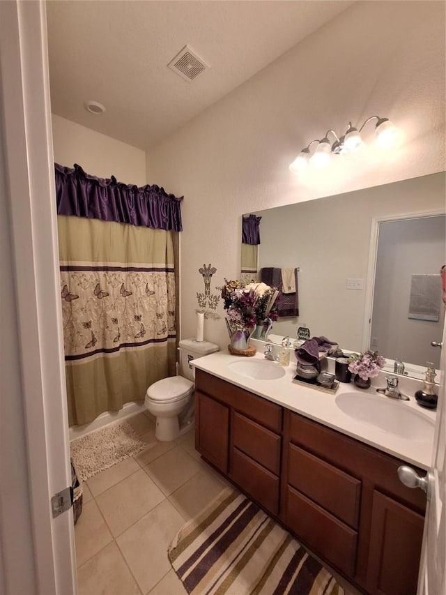 3210 Vintage View Ln, Pearland, TX 77584 - bathroom with double vanity, tile patterned flooring, toilet, and a shower with shower curtain