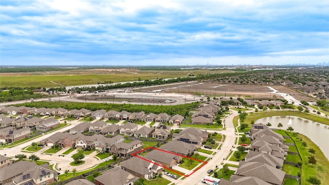 3210 Vintage View Ln, Pearland, TX 77584 - aerial view of residential area with property boundaries highlighted and a large body of water