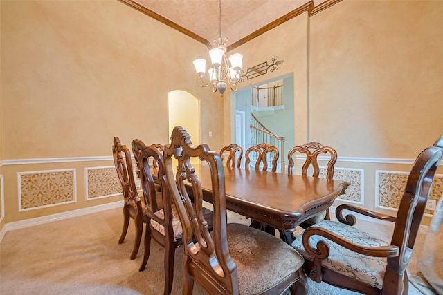 dining room featuring arched walkways, stairway, carpet flooring, and a notable chandelier