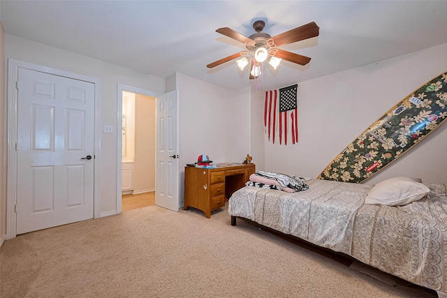 carpeted bedroom featuring ceiling fan
