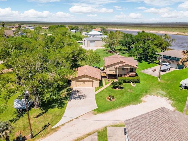 birds eye view of property with a residential view