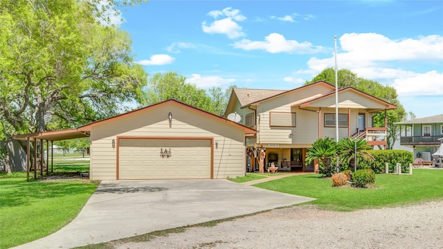view of front of home featuring driveway and a front lawn