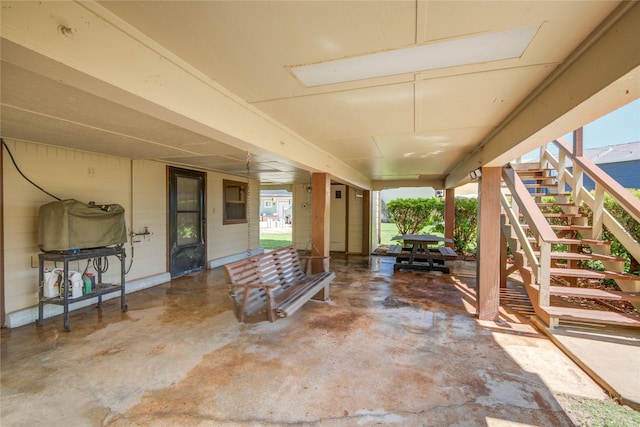 view of patio / terrace featuring stairway