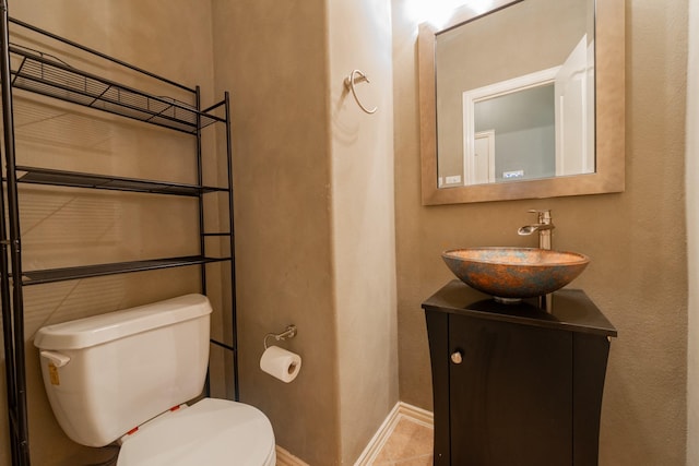 24807 Mason Trail Dr, Katy, TX 77493 - bathroom featuring tile patterned floors, toilet, vanity, and baseboards