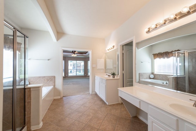 24807 Mason Trail Dr, Katy, TX 77493 - full bathroom featuring a bath, a sink, a shower stall, two vanities, and tile patterned flooring