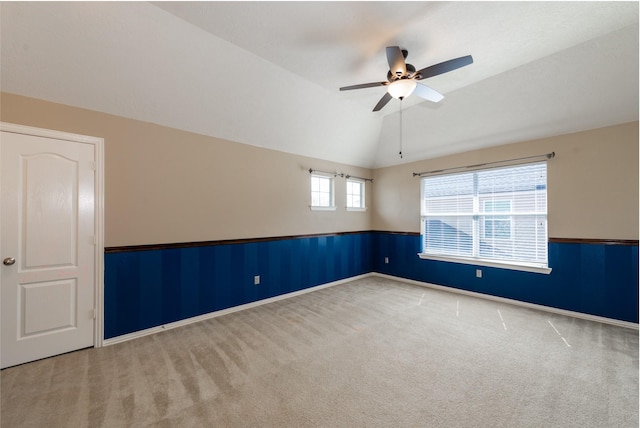 24807 Mason Trail Dr, Katy, TX 77493 - spare room with baseboards, carpet flooring, vaulted ceiling, and a ceiling fan