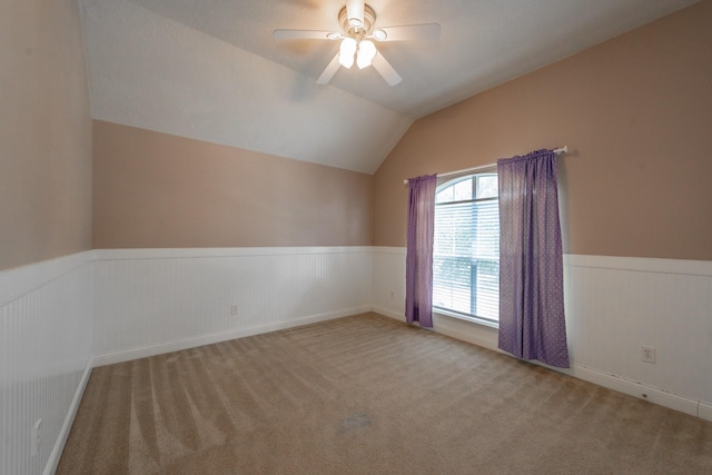 24807 Mason Trail Dr, Katy, TX 77493 - carpeted empty room featuring wainscoting, a ceiling fan, and lofted ceiling
