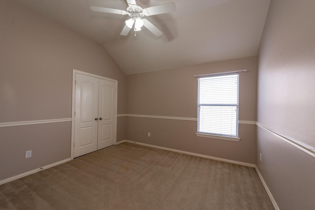 24807 Mason Trail Dr, Katy, TX 77493 - unfurnished bedroom featuring carpet, baseboards, and lofted ceiling