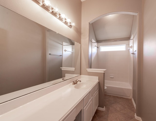 24807 Mason Trail Dr, Katy, TX 77493 - bathroom featuring washtub / shower combination, baseboards, toilet, vanity, and tile patterned flooring