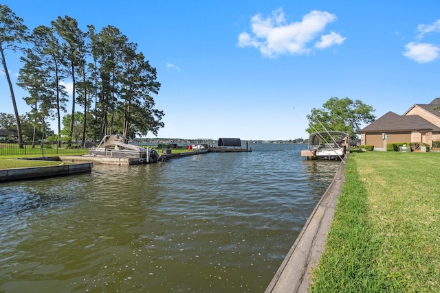 2906 Penninsula Pt, Montgomery, TX 77356 - dock with a water view and a yard