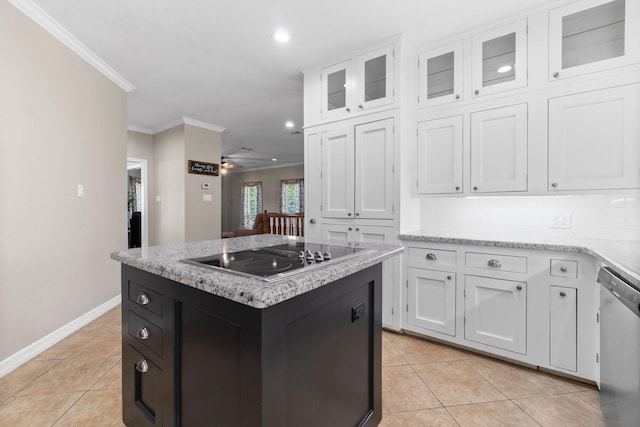 2906 Penninsula Pt, Montgomery, TX 77356 - kitchen with black electric cooktop, stainless steel dishwasher, crown molding, light tile patterned floors, and white cabinets