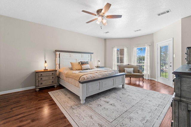2906 Penninsula Pt, Montgomery, TX 77356 - bedroom featuring access to outside, dark wood-style flooring, and a ceiling fan