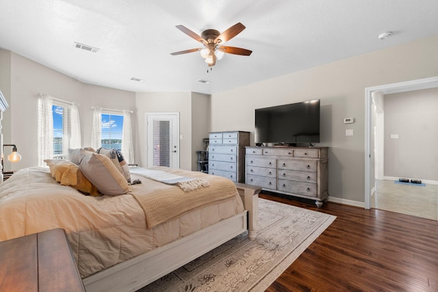 2906 Penninsula Pt, Montgomery, TX 77356 - bedroom with wood finished floors and ceiling fan