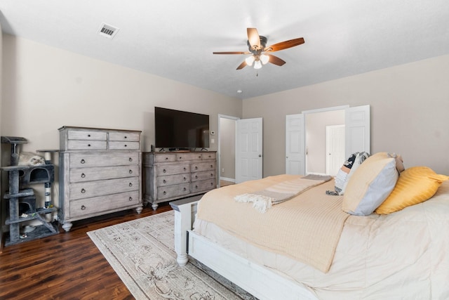 2906 Penninsula Pt, Montgomery, TX 77356 - bedroom with wood finished floors and ceiling fan