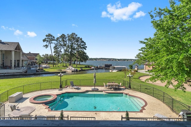 2906 Penninsula Pt, Montgomery, TX 77356 - view of pool with a water view, a patio, and a pool with connected hot tub
