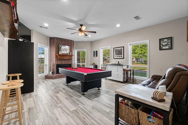 2906 Penninsula Pt, Montgomery, TX 77356 - rec room featuring ceiling fan, a fireplace, billiards, recessed lighting, and light wood finished floors