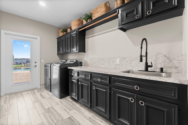 2906 Penninsula Pt, Montgomery, TX 77356 - washroom featuring cabinet space and separate washer and dryer