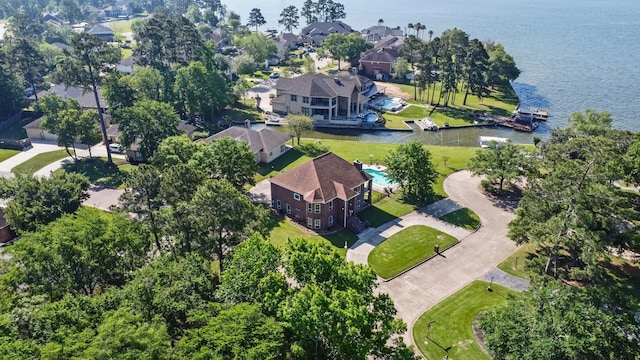 2906 Penninsula Pt, Montgomery, TX 77356 - aerial perspective of suburban area with a nearby body of water