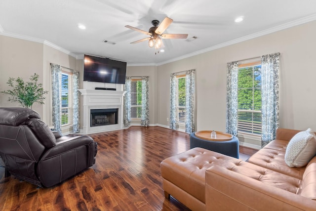 2906 Penninsula Pt, Montgomery, TX 77356 - living room featuring wood finished floors, ceiling fan, plenty of natural light, recessed lighting, and a fireplace