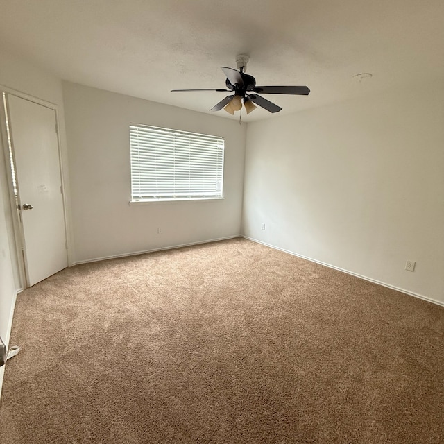 11422 Royal Thistle Ct, Houston, TX 77088 - carpeted spare room with ceiling fan and baseboards