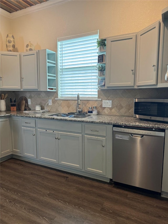 kitchen with appliances with stainless steel finishes, ornamental molding, open shelves, dark wood finished floors, and decorative backsplash