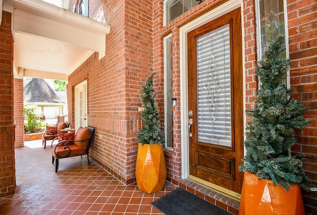 37703 Edgewater Dr, Pinehurst, TX 77362 - entrance to property with covered porch and brick siding