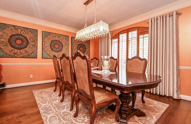 37703 Edgewater Dr, Pinehurst, TX 77362 - dining room with crown molding, wood finished floors, baseboards, and a chandelier