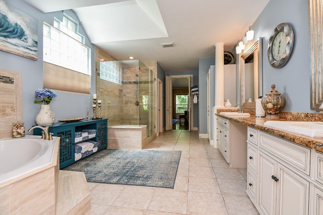 37703 Edgewater Dr, Pinehurst, TX 77362 - full bath featuring a shower stall, tile patterned floors, a garden tub, vanity, and healthy amount of natural light