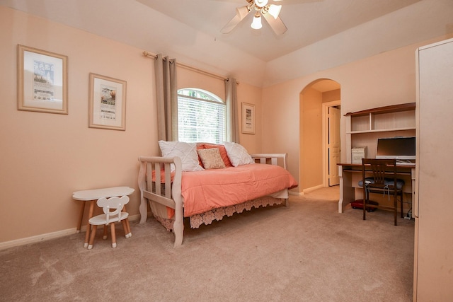 37703 Edgewater Dr, Pinehurst, TX 77362 - bedroom with arched walkways, carpet floors, an office area, lofted ceiling, and a ceiling fan