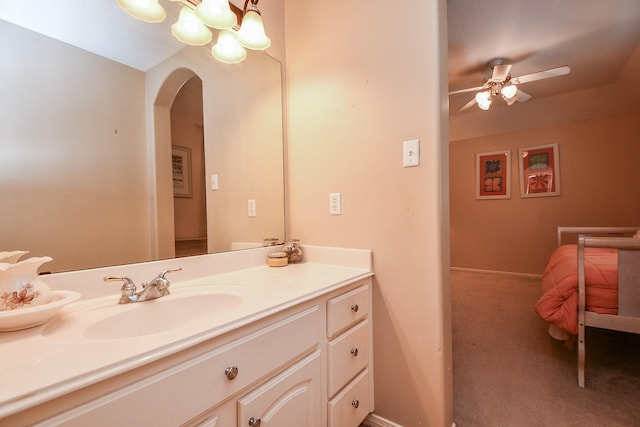 37703 Edgewater Dr, Pinehurst, TX 77362 - bathroom with ceiling fan, vanity, and a chandelier