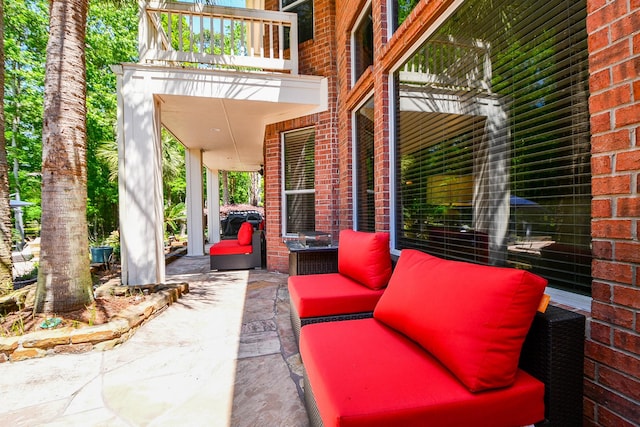 37703 Edgewater Dr, Pinehurst, TX 77362 - view of patio featuring a balcony
