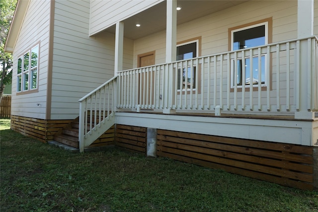 exterior space with a yard and covered porch