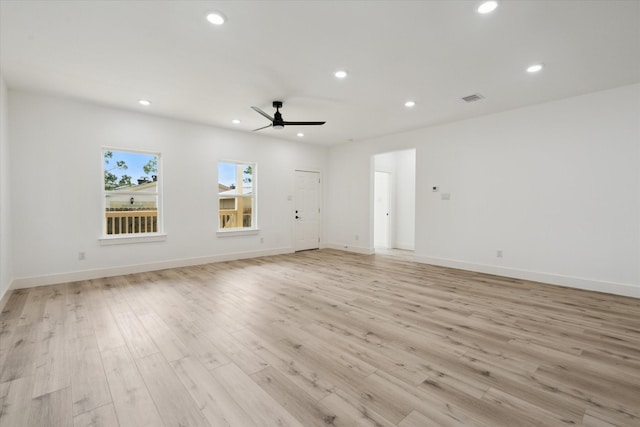 6319 Ivyknoll Dr, Houston, TX 77035 - unfurnished living room featuring recessed lighting, a ceiling fan, light wood-style floors, and baseboards