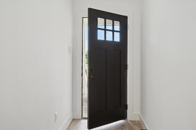 6319 Ivyknoll Dr, Houston, TX 77035 - foyer entrance with light wood-style flooring and baseboards