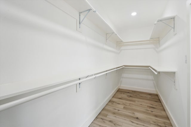 6319 Ivyknoll Dr, Houston, TX 77035 - walk in closet featuring light wood-type flooring