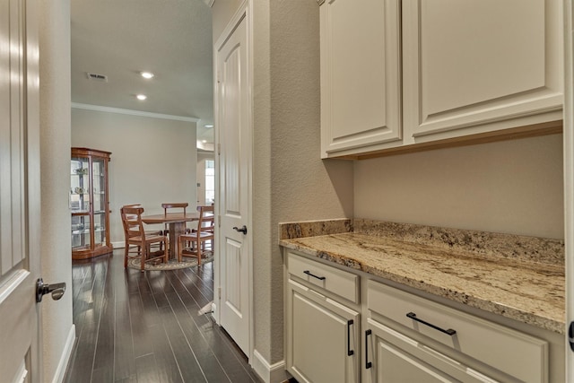 271 Spotted Saddle Ct, The Woodlands, TX 77382 - bar featuring crown molding, visible vents, baseboards, dark wood-style floors, and recessed lighting