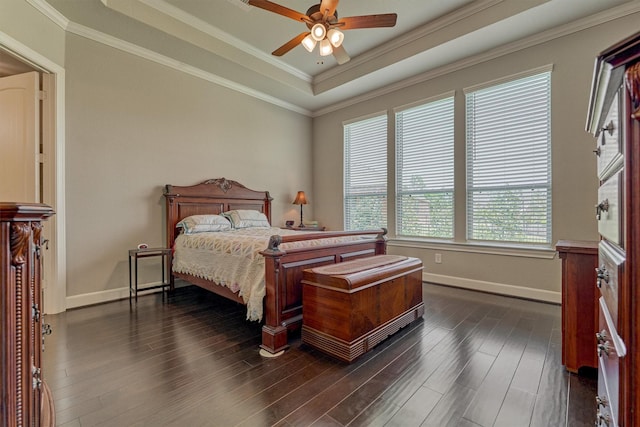 271 Spotted Saddle Ct, The Woodlands, TX 77382 - bedroom featuring dark wood-type flooring, baseboards, crown molding, and a raised ceiling