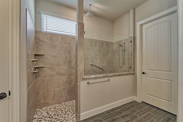 271 Spotted Saddle Ct, The Woodlands, TX 77382 - full bathroom with a walk in shower, baseboards, and wood finished floors