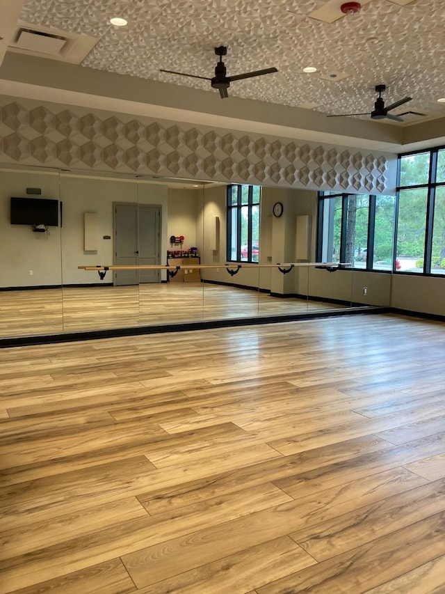 271 Spotted Saddle Ct, The Woodlands, TX 77382 - interior space with vaulted ceiling, a ceiling fan, wood finished floors, and plenty of natural light