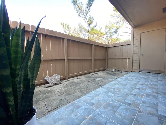 10555 Turtlewood Ct Unit 2102, Houston, TX 77072 - view of patio / terrace with fence and visible vents