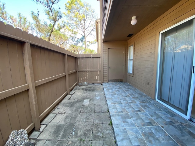 10555 Turtlewood Ct Unit 2102, Houston, TX 77072 - view of patio featuring fence